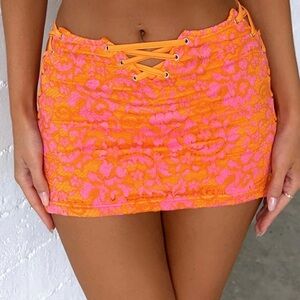 Outcast pink and orange lace up mini skirt